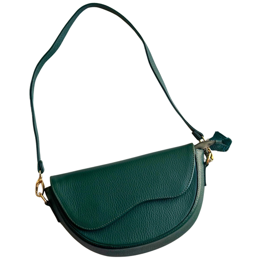 A dark green pebbled leather crescent-shaped shoulder bag with a matching adjustable shoulder strap and gold-tone hardware, shown on a plain white background